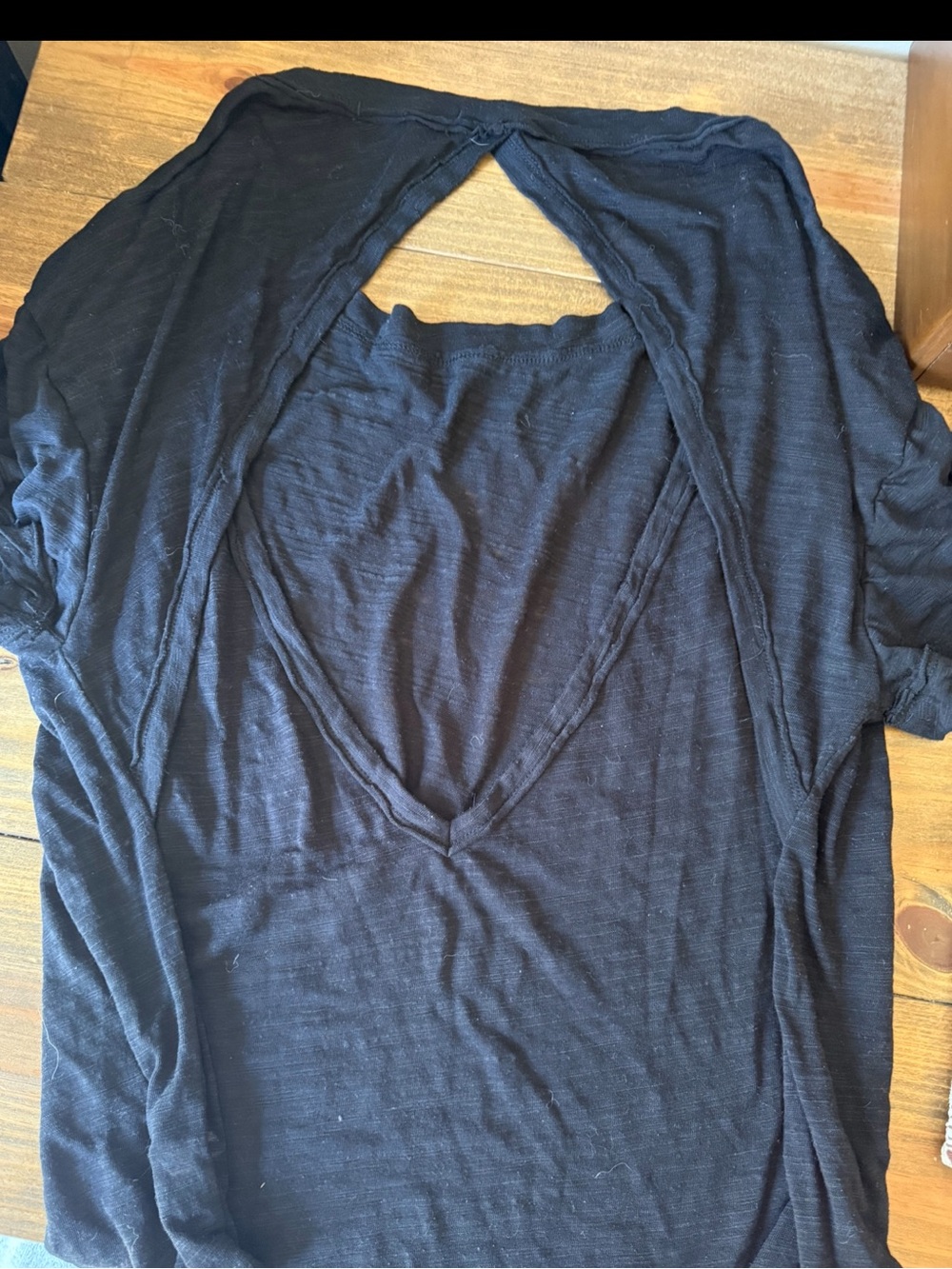 Women’s size Large We The Free by Free People Black Short-Sleeve Open-Back Tee
